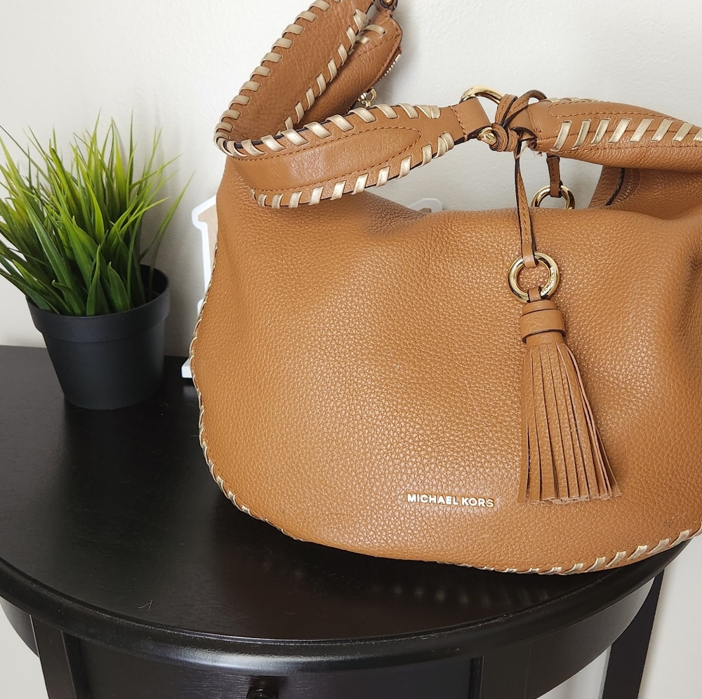 Michael Kors Lauryn Bag gold whipstich Acorn color with duster included.